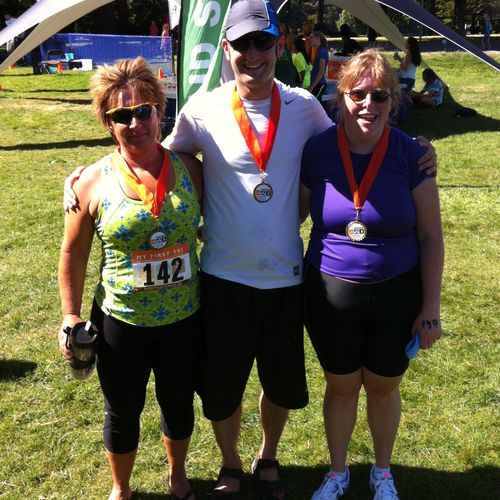 Two clients after finishing their first triathlon.