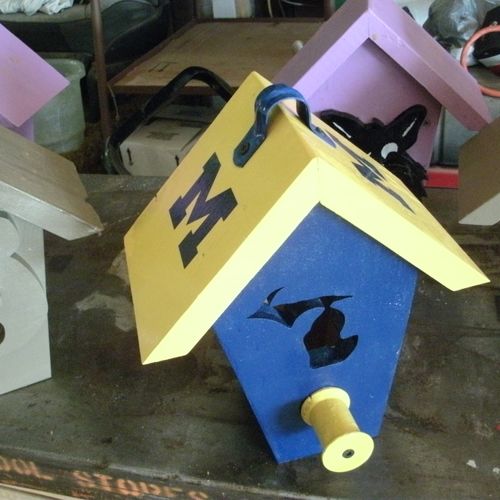 Bird houses in many unique styles.