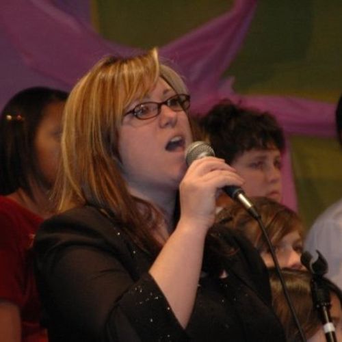 Singing a solo in December 2008 with the children'