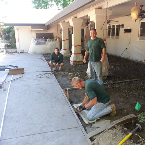 Installing concrete at Len Residence