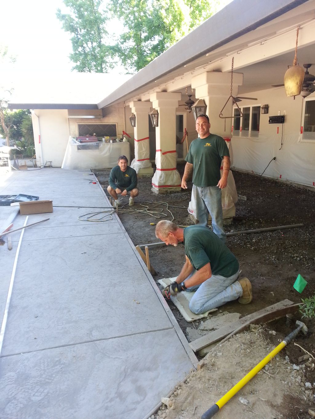 Installing concrete at Len Residence