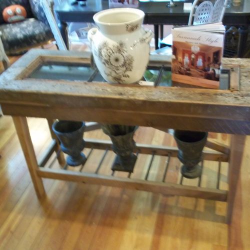 This industrial sofa table has a  vintage industri