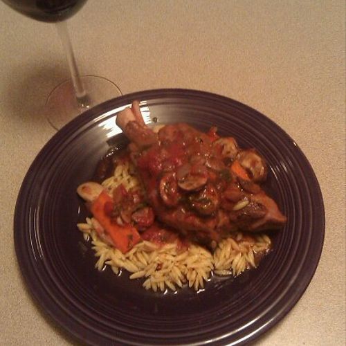 Red wine braised lamb shanks over orzo