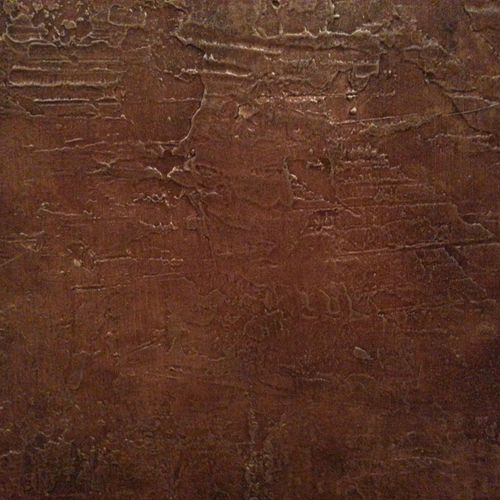 DETAIL: Wall texture, brown glazes, shiny gold met