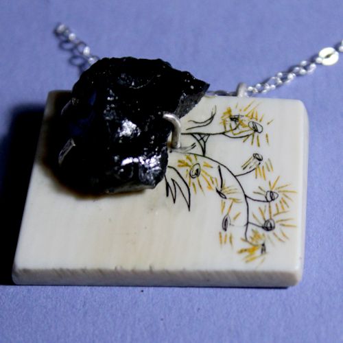 A necklace made from a slice of mammoth ivory with