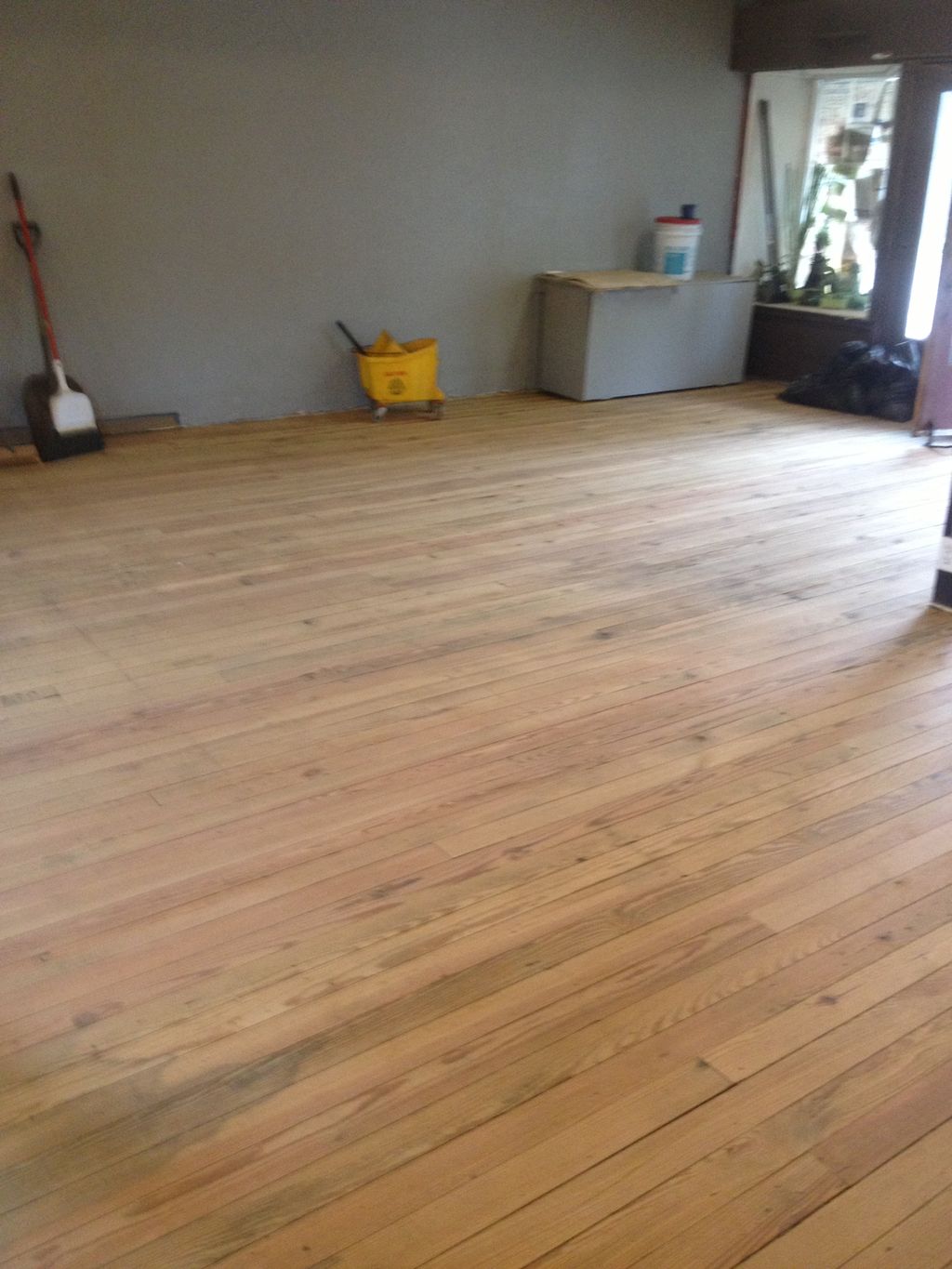 Refinishing  hard wood floors.