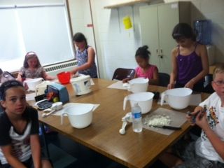 Making stuffed peppers for our families for dinner