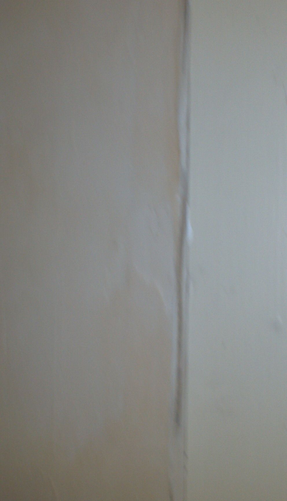 Patched wall ready to sand, smooth, prime and pain