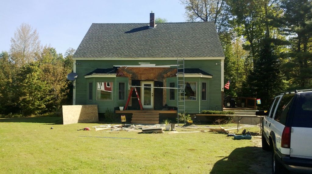 making one roof out of two that are over the bay w