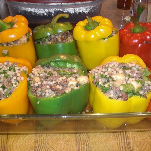 Stuffed peppers with pearl couscous and ground bee