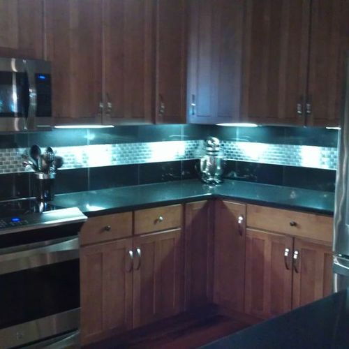 Granite countertops with granite and stainless bac