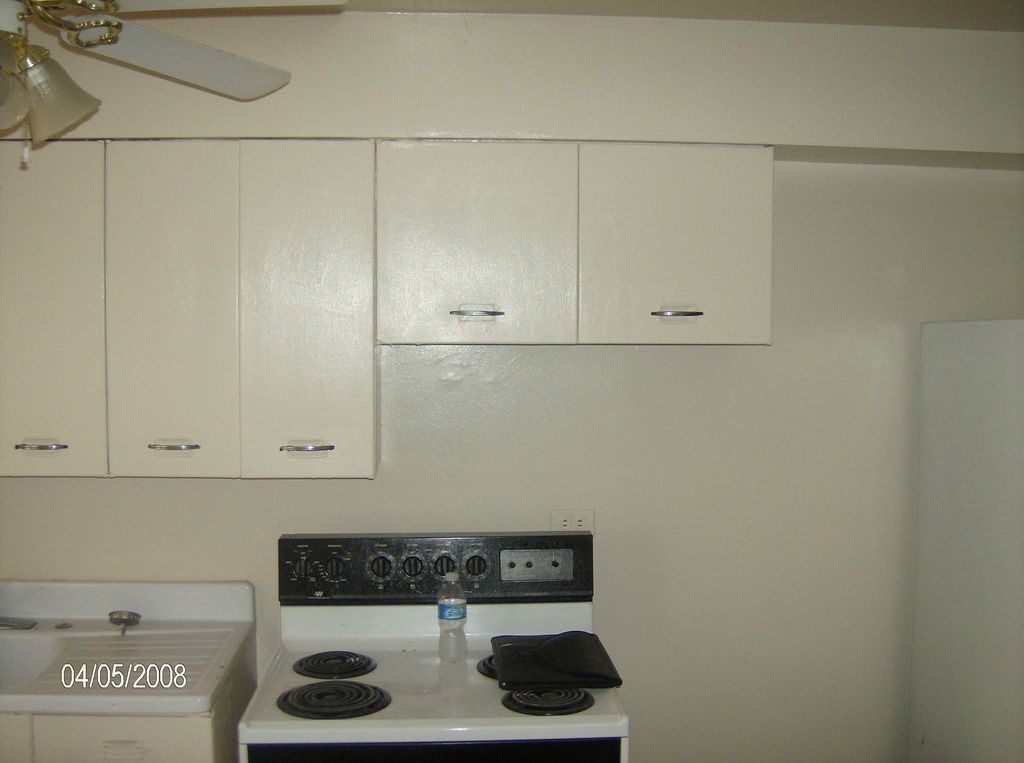 Walls & cabinets restored w/ 2 coats of paint to m