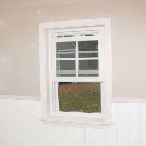 New window and trim, enlarged opening and wanescot