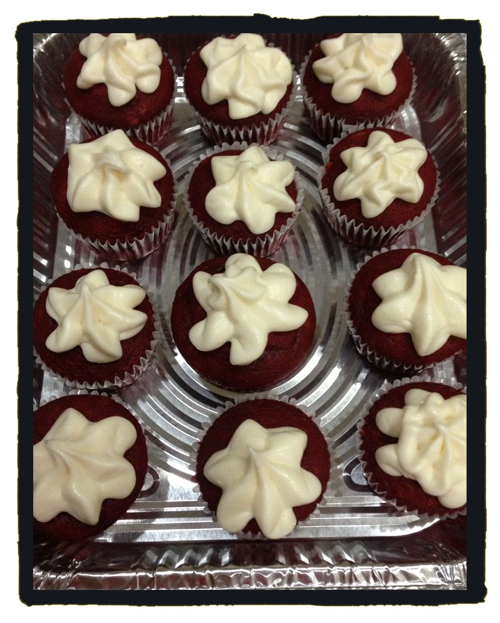 Red velvet cupcakes with cream cheese frosting