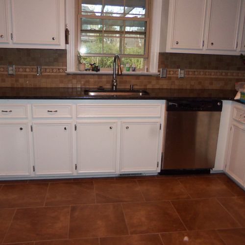 Cabinets, granite tops,backsplash, and new tile fl