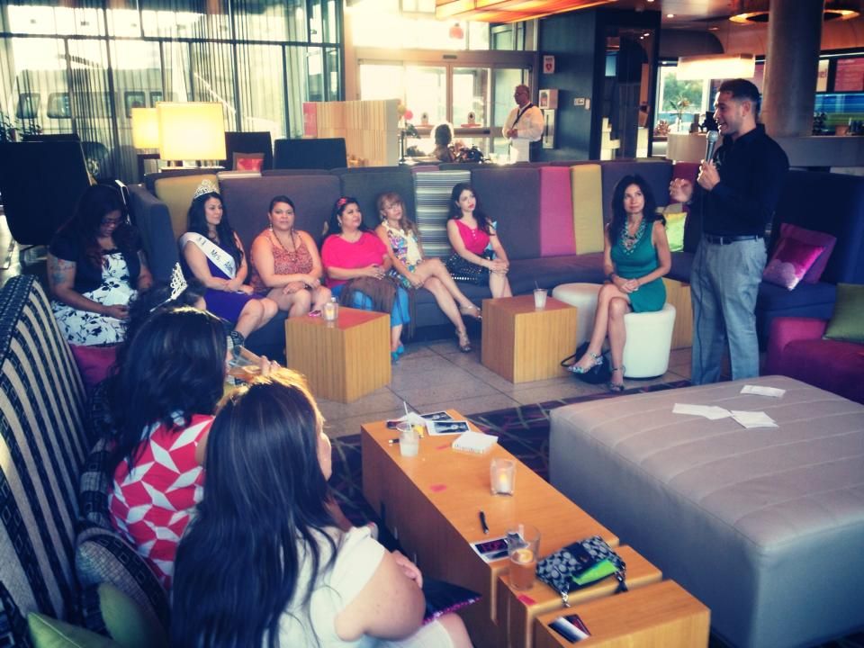 Luis hosting a Q&A at Women in Heels Charity Event