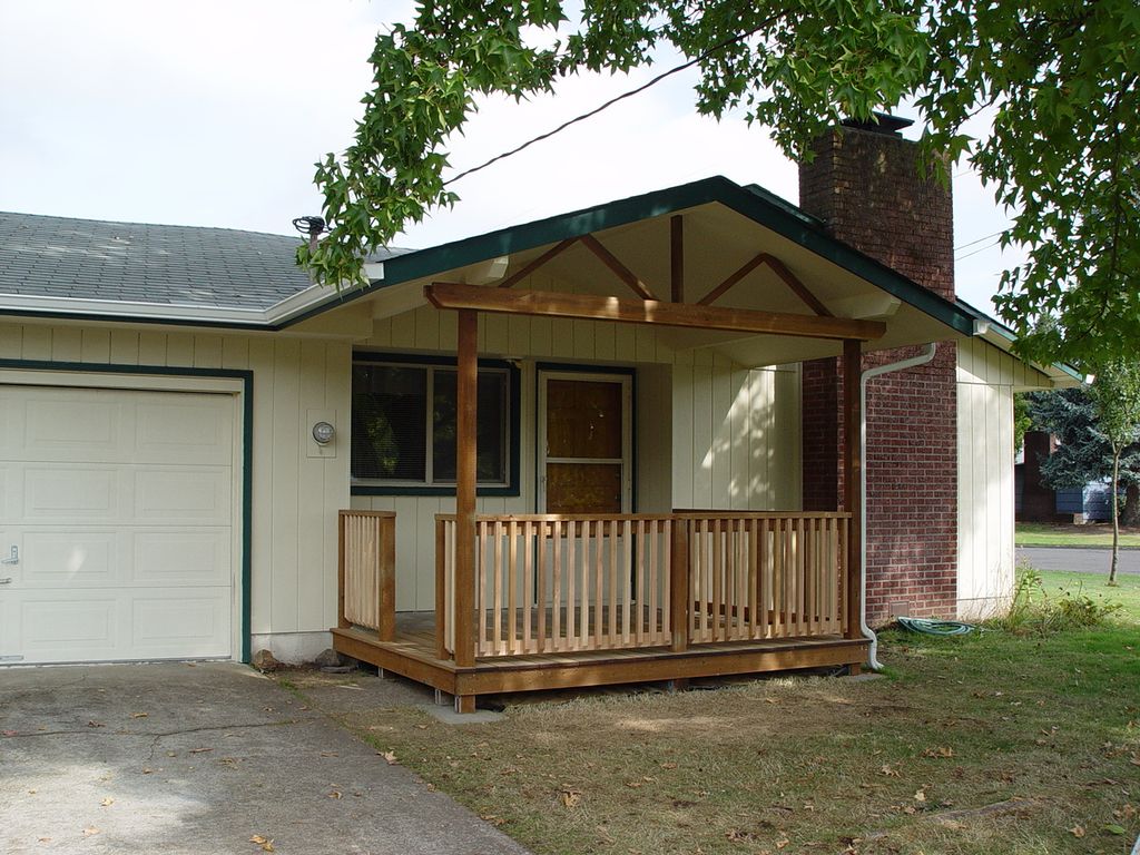 Porch on the front of a house with a finished ceil