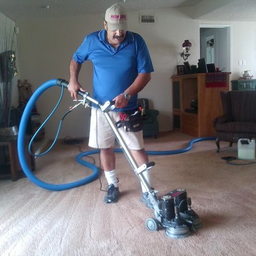 BILL  THE OWNER USEING THE ROTO VAC