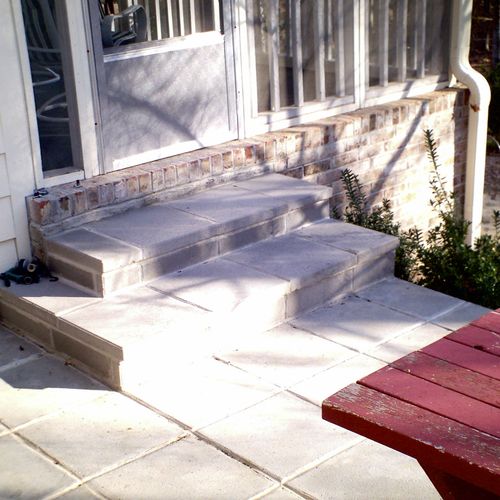 Concrete patio tiles and two steps