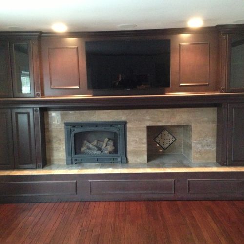 Built in Cabinet over brick fireplace and traverti