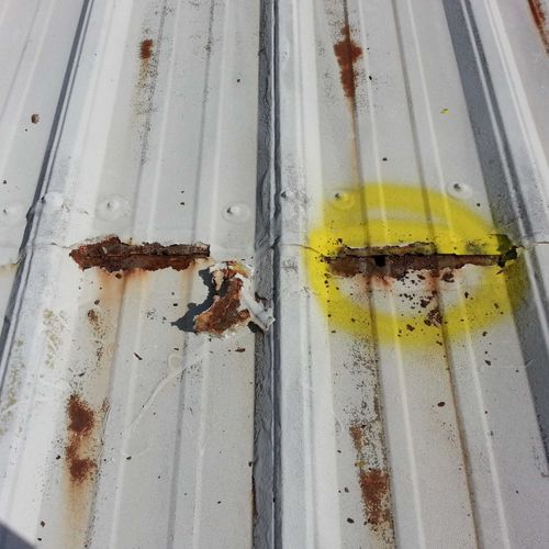 Metal Roof Restoration- We took on this Rusted and
