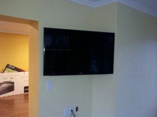 47" TV mounted in Office with articulating mount