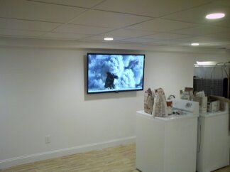 55" TV mounted  in Basement with tilt mount