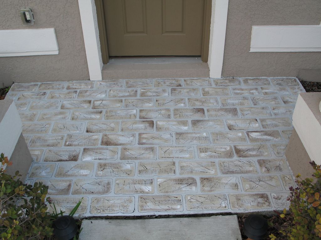 Concrete entry floor art