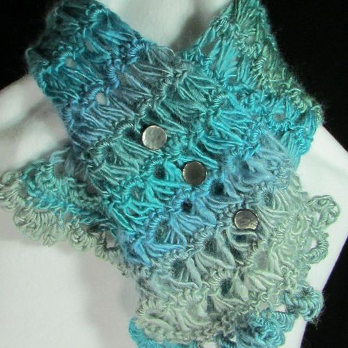 This is a hand crocheted Broomstick Lace neck warm