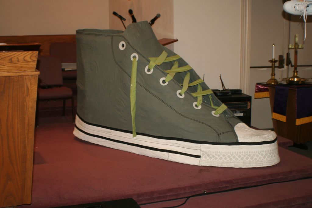 3-D shoe approximately 5'x 7'.