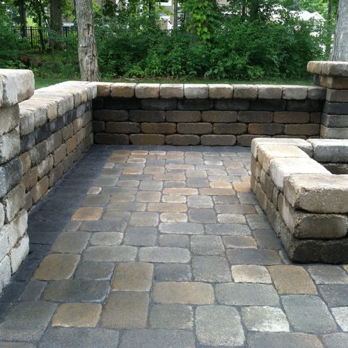 We build custom patios that can include sitting wa