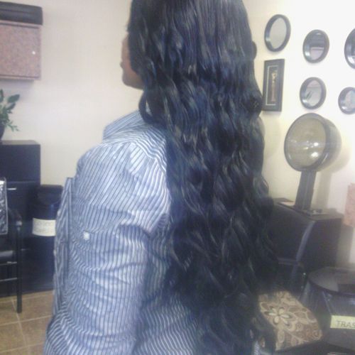 My client has 27" inch hair extensions with a wavy