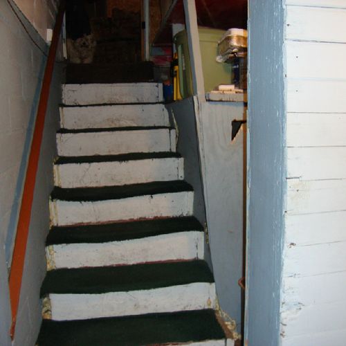 Before--damaged, uneven stairs