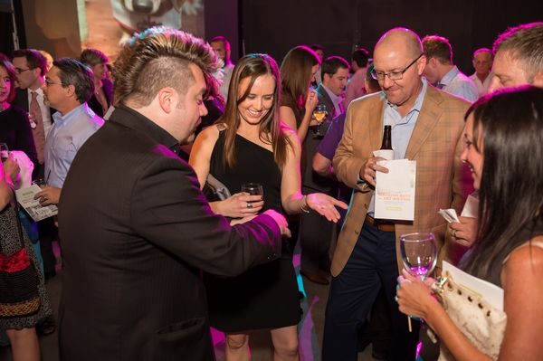 Performing interactive close-up magic for a cockta
