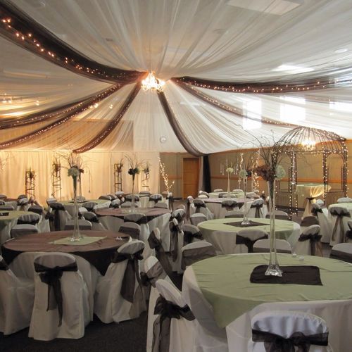 A Perfect Touch Events creates ceiling drapes to h