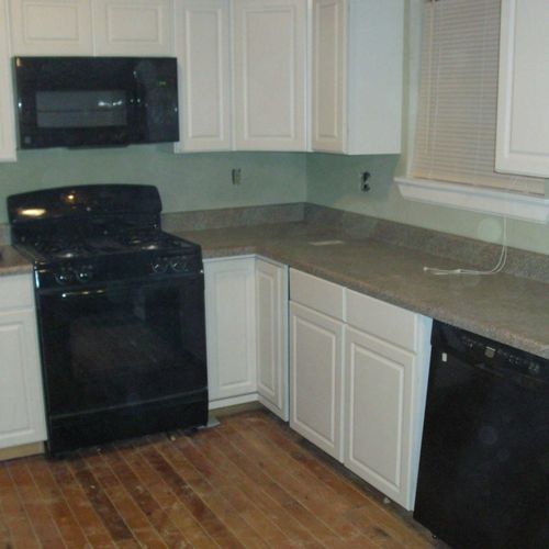 install new cabinets and hard woods flooring