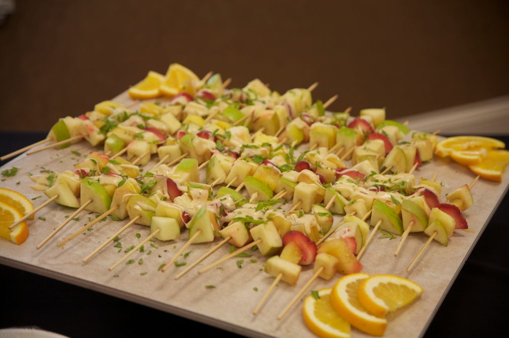 Fresh fruit kabobs served with gruyere cheese sauc