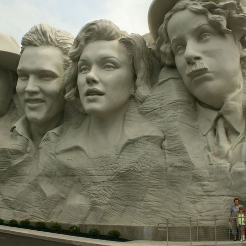 Foam sculptor for these 5 story high heads