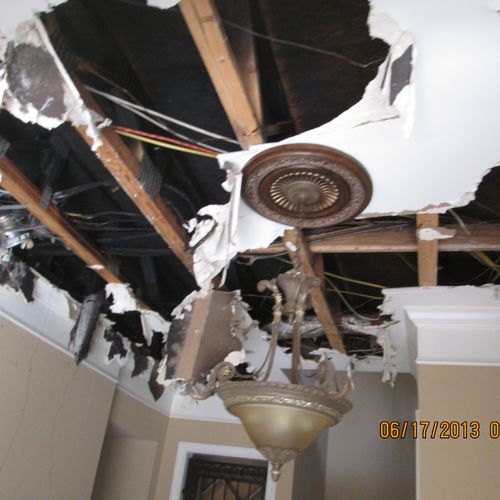 fire damage to home ceiling dining room