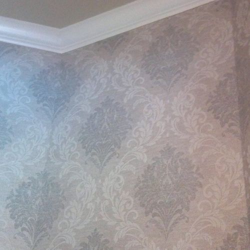 Traditional and beautiful damask wallpaper in half
