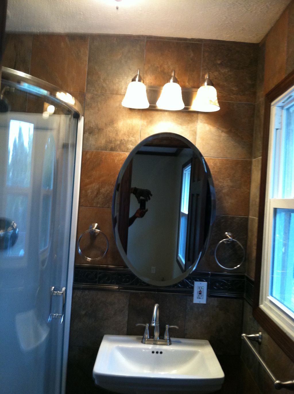 Demoed the bathroom and finished with corner showe