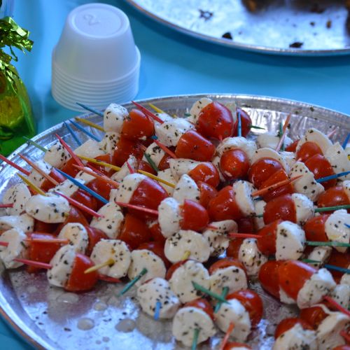 Caprese skewers -mozzarella, tomato with olive oil