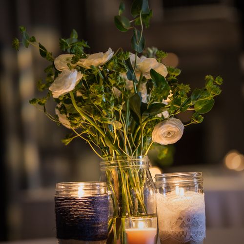 Centerpieces with candles on a wood slice
