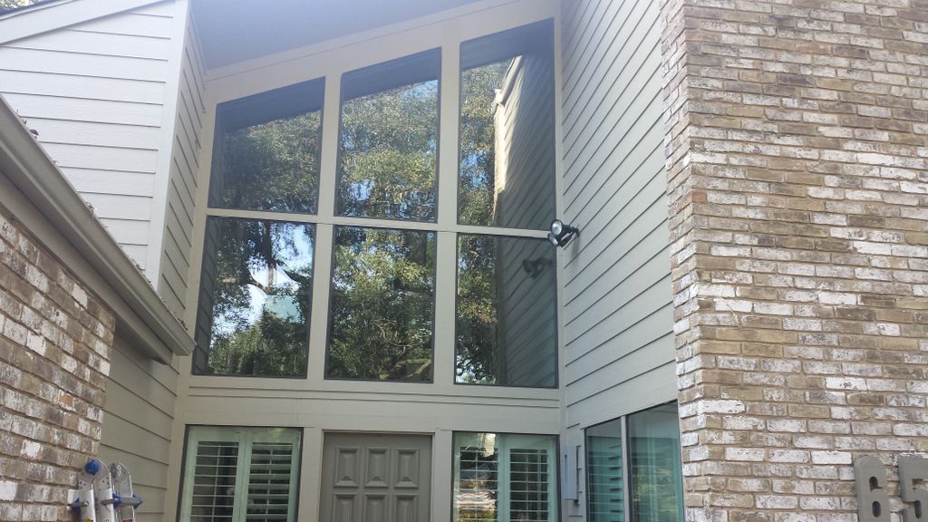 Another contemporary style home with high angled w