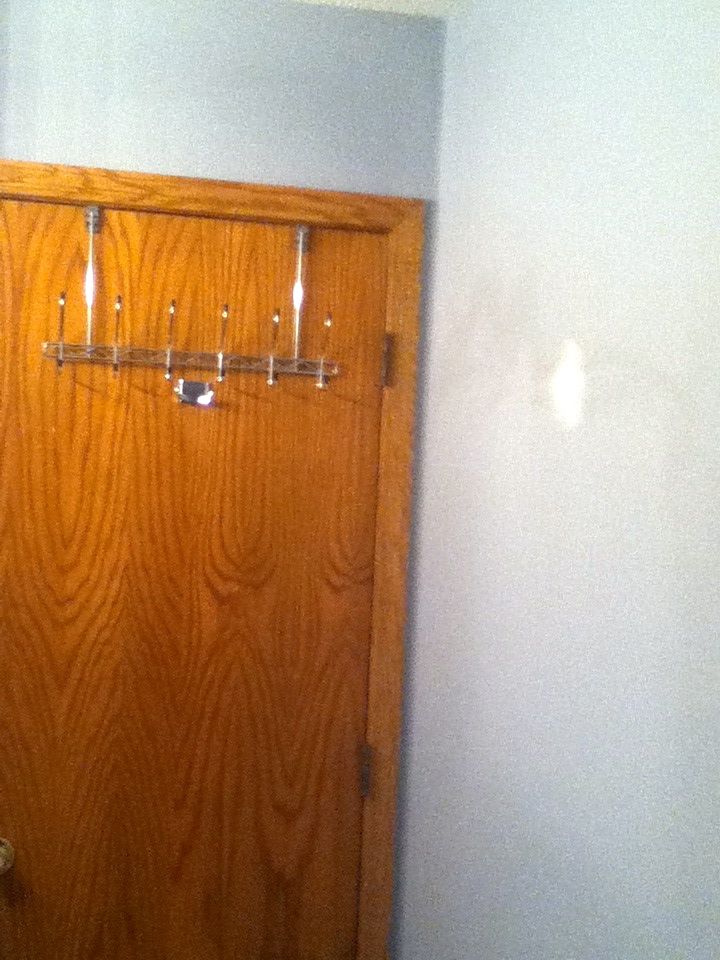 BEFORE Photo: Bathroom job before wall repair and 