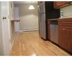 Installed hardwood flooring in kitchen and dining 