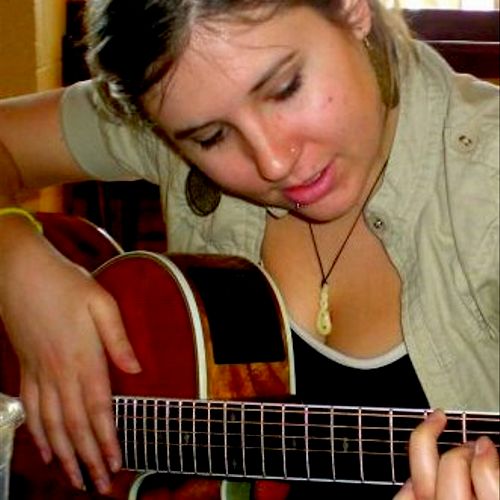 Talented percussionist Melissa, learning guitar to