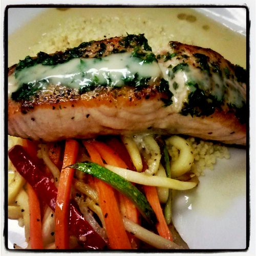 Pan Seared Salmon atop a bed of Herbed Cous Cous, 