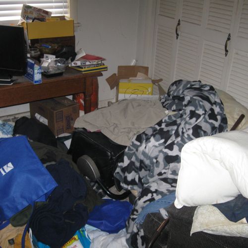 The bedroom was close to a hoarder situation!
