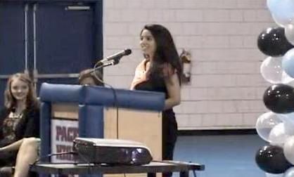 Michelle Cruz Rosado addresses students at Pace Hi